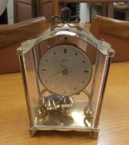 A SCHATZ ANNIVERSARY CLOCK, BRASS WITH FOUR GLASS PANELS