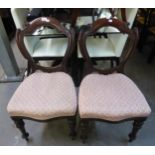 A PAIR OF VICTORIAN MAHOGANY BALLOON BACK DINING CHAIRS (2)