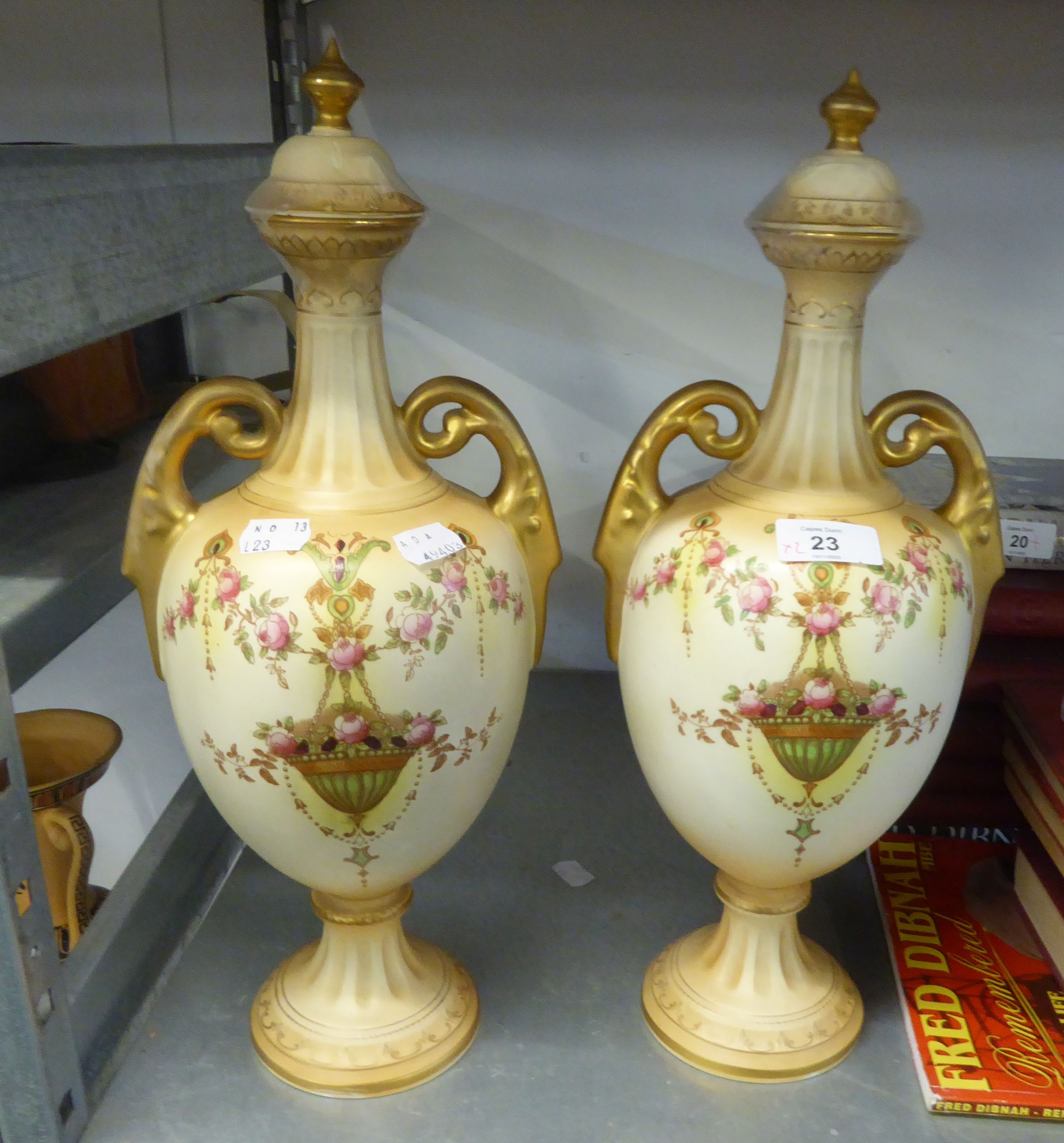 A PAIR OF CROWN DEVON BLUSH IVORY 'ALBAMBRA' VASES WITH LIDS (2)