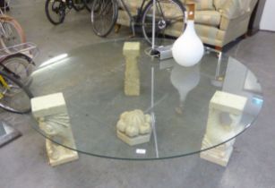 LARGE CIRCULAR GLASS COFFEE TABLE WITH DOLPHIN CARVED THREE CORBEL SUPPORTS WITH CENTRE PIECE