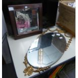 TWO MIRRORS, OVAL FRAMELESS BEVELLED EDGE WITH METAL ORNATE FRAMING DESIGN TOGETHER WITH A SQUARE