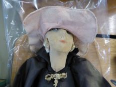 INTER-WAR YEARS FASHION DOLL WITH FABRIC HEAD and FLOUNCED HAT, BLACK SATIN DRESS AND UNDER