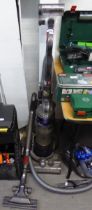 DYSON DC25 ROLLER BALL VACUUM CLEANER AND A DYSON CITY DC 26 VACUUM CLEANER WITH ACCESSORIES (2)
