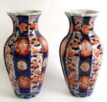 PAIR OF LATE 19th CENTURY ORIENTAL IMARI PORCELAIN PANELLED OVULAR VASES, 10 1/4in (26cm) high (2)