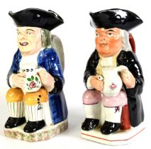 19th CENTURY DAVENPORT POTTERY SEATED TOBY JUG, depicted holding a foaming mug of ale in two