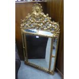 MODERN REPRODUCTION GILT FRAMED CUSHION MIRROR WITH ACANTHUS AND FRUIT CARTOUCHE