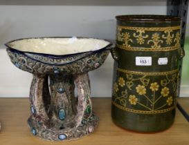 A GLAZED GREEN TERRACOTTA LIDDED POT WITH FLORAL EMBOSSED DECORATION, POSSIBLY FOR STORING