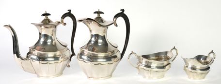 GEORGIAN STYLE ELECTROPLATE TEA SERVICE OF FOUR PIECES, of bulbous oval form with panelled lower