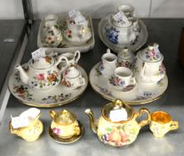 FOUR CERAMIC DOLL’S TEA SETS AND A BACHELOR’S SET [5]