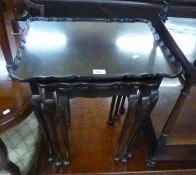 NEST OF THREE MAHOGANY TABLES WITH PIE-CRUST EDGE