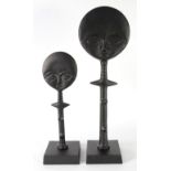 AFRICAN SCULPTURE BLACK METAL FERTILITY FIGURE in totem form, with moon shaped head, on square