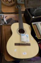 CHANTRY CHINESE ACOUSTIC GUITAR AND TWO TUTORIAL BOOKS
