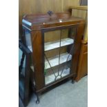 1930’S QUARTERED MAHOGANY DISPLAY CABINET, ON CABRIOLE LEGS
