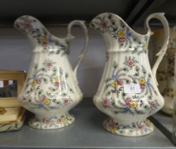 A PAIR OF VICTORIAN POTTERY 'FEATHER' PATTERN LARGE TOILET JUGS (2)