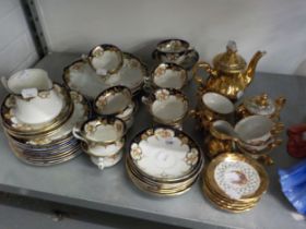 1920's BLUE BANDED AND ROSE PAINTED TEA WARES, APPROX 36 PIECES AND A BAVARIA GOLD LUSTRE COFFEE SET
