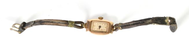 LADY'S 9CT GOLD CASED vintage wristwatch with 15 jewels swiss movement narrow oblong arabic dial