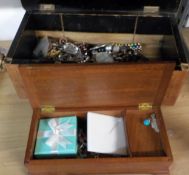 AN ORIGINALLY SWISS MUSICAL BOX (NO MOVEMENT), CONTAINING COSTUME JEWELLERY, AN ANOTHER SMALLER