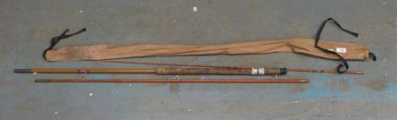 A SPLIT CANE FISHING ROD