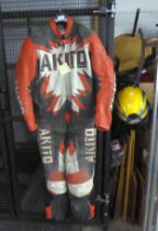 ATIKO VINTAGE BIKE LEATHERS IN RED, WHITE AND BLACK, UK40, AND A LAZER MOTORBIKE HELMET (2)