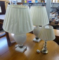 A WHITE OPAQUE GLASS URN SHAPED TABLE LAMP AND SHADE AND ANOTHER TABLE LAMP