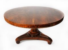 GOOD QUALITY WILLIAM IV ROSEWOOD TILT-TOP DINING TABLE, the circular top with nulled border to the