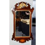 EARLY TWENTIETH CENTURY GEORGIAN STYLE MAHOGANY AND PARCEL GILT WALL MIRROR, of vertical, rounded