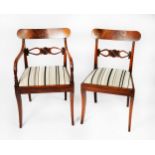 SET OF EIGHT REGENCY FIGURED AND CARVED MAHOGANY DINING CHAIRS, comprising: FOUR SINGLE CHAIRS and