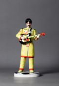 LORNA BAILEY, THE BEATLES, JOHN LENNON CERAMIC FIGURE, in the Sgt Pepper yellow jacket, on a black