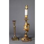 GILT METAL ROCOCO OPENWORK TABLE LAMP with foliate scroll column, leaf embossed urn shaped sconce