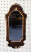 EARLY TWENTIETH CENTURY GEORGIAN STYLE FIGURED WALNUT AND PARCEL GILT WALL MIRROR, the vertical