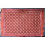 TUNISIAN FLAT WEAVE SMALL CARPET, with all-over diamond shaped diaper pattern on a deep pink