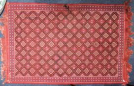 TUNISIAN FLAT WEAVE SMALL CARPET, with all-over diamond shaped diaper pattern on a deep pink