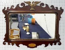 EARLY TWENTIETH CENTURY GEORGIAN STYLE MAHOGANY AND PARCEL GILT FRAMED WALL MIRROR, of rounded