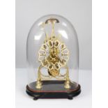 NINETEENTH CENTURY BRASS SKELETON CLOCK, the 6 ¼” pierced and enamelled Roman chapter ring powered