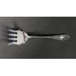 EDWARD VII SILVER SARDINE SERVING FORK BY CHARLES WILKES, with fancy embossed handle, 5” (12.7cm)