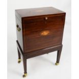 GEORGE III INLAID MAHOGANY CELLARETTE, the oblong top with oval shell inlay, set above a matching