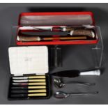 SIPPEL LTD., SHEFFIELD, CARVING KNIFE, FORK AND STEEL, with buckhorn handles, in red morocco case (