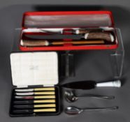 SIPPEL LTD., SHEFFIELD, CARVING KNIFE, FORK AND STEEL, with buckhorn handles, in red morocco case (