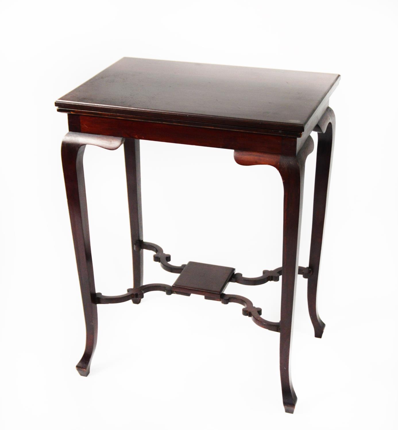 A DARK MAHOGANY OBLONG CARD TABLE, with swivel and flap top, on shaped cabriole supports with shaped