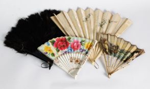 TWO FINE BLACK LACE FANS, hand-painted with flowers, black stained sticks, 14in (35.5cm) long; 3