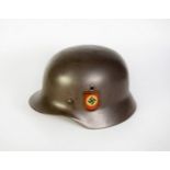 GERMAN STEEL HELMET, with SS decal and swastika applied, numbered E164 and 6211, with yellow leather