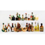 COLLECTION OF 33 MINIATURE BOTTLES OF SPIRITS, mostly unopened (c/r three bottles empty; some