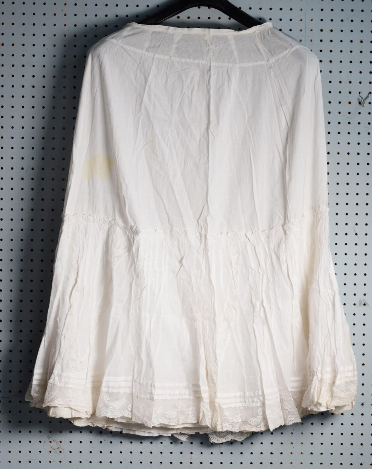 EARLY VICTORIAN WHITE LACE UNDERSKIRT, the lower portion double layered, white floral embroidered