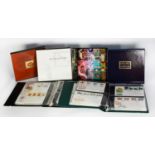 STAMPS, SELECTION OF 12 GB YEAR BOOKS plus 7 GB first day cover binder, (some hand-written)