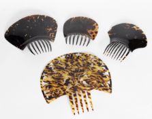FOUR LARGE VICTORIAN PRESSED TORTOISESHELL LIKE PIENETA OR HAIR COMBS, 9 1/2in (24.1cm), 8 1/4in (