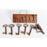COLLECTION OF KEYS, INCLUDING ANTIQUE, and SOME MOUNTED ON TWO VINTAGE MOULDING PLANES, contents