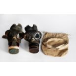 TWO WWII CIVILIAN GAS MASKS, with one bag marked FYLDE DISTRICT COUNCIL (3)