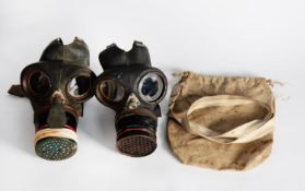 TWO WWII CIVILIAN GAS MASKS, with one bag marked FYLDE DISTRICT COUNCIL (3)