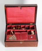 VICTORIAN FIGURED MAHOGANY WORK BOX with pewter line and mother of pearl inlay, with red silk
