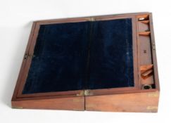 19th CENTURY LARGE FIGURED MAHOGANY PORTABLE WRITING BOX, with brass bound corners, the interior